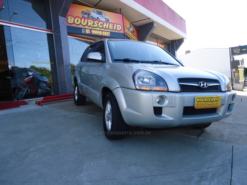 tucson 2.0 mpfi gls base 16v 143cv 2wd flex 4p automatico 2013 santa clara do sul