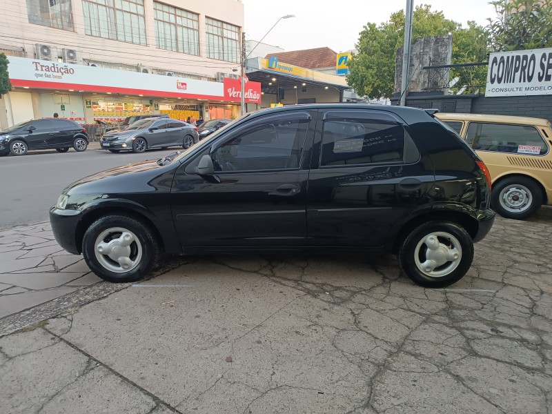 CELTA 1.0 MPFI SUPER 8V FLEX 4P MANUAL - 2003 - FLORES DA CUNHA