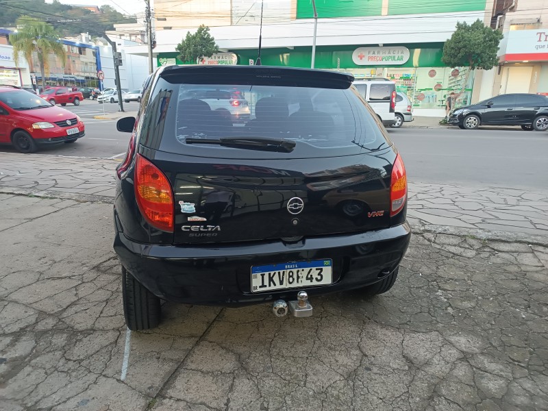 CELTA 1.0 MPFI SUPER 8V FLEX 4P MANUAL - 2003 - FLORES DA CUNHA
