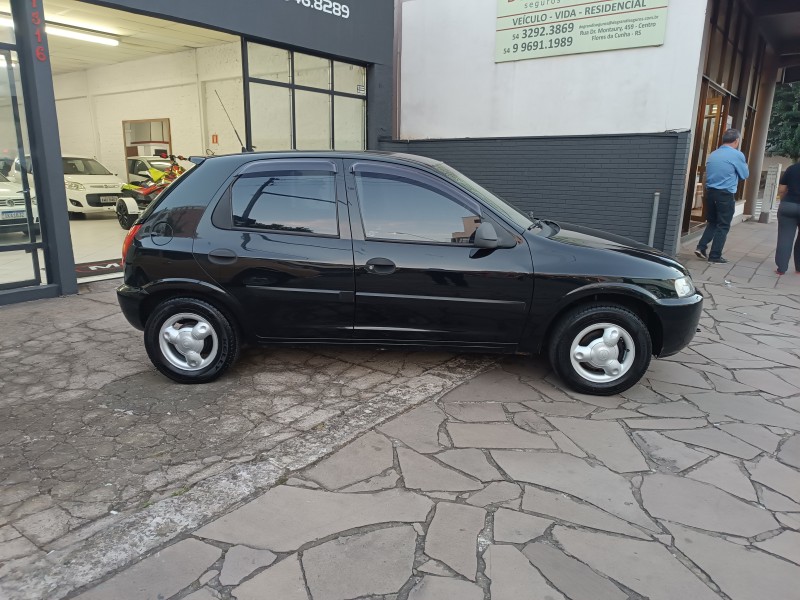 CELTA 1.0 MPFI SUPER 8V FLEX 4P MANUAL - 2003 - FLORES DA CUNHA