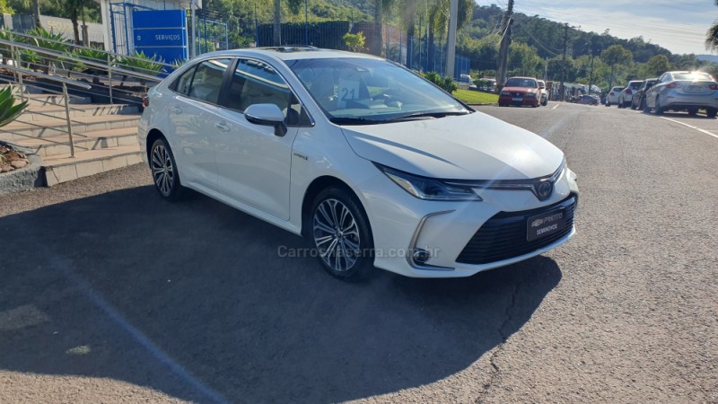 COROLLA 1.8 ALTIS PREMIUM 16V HÍBRIDO 4P AUTOMÁTICO - 2021 - ENCANTADO