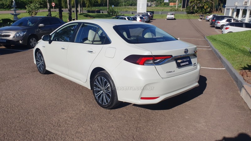 COROLLA 1.8 ALTIS PREMIUM 16V HÍBRIDO 4P AUTOMÁTICO - 2021 - ENCANTADO