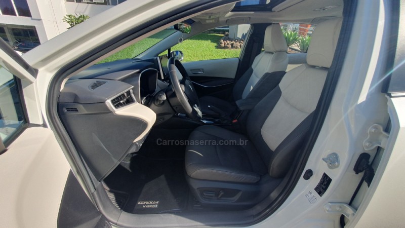 COROLLA 1.8 ALTIS PREMIUM 16V HÍBRIDO 4P AUTOMÁTICO - 2021 - ENCANTADO