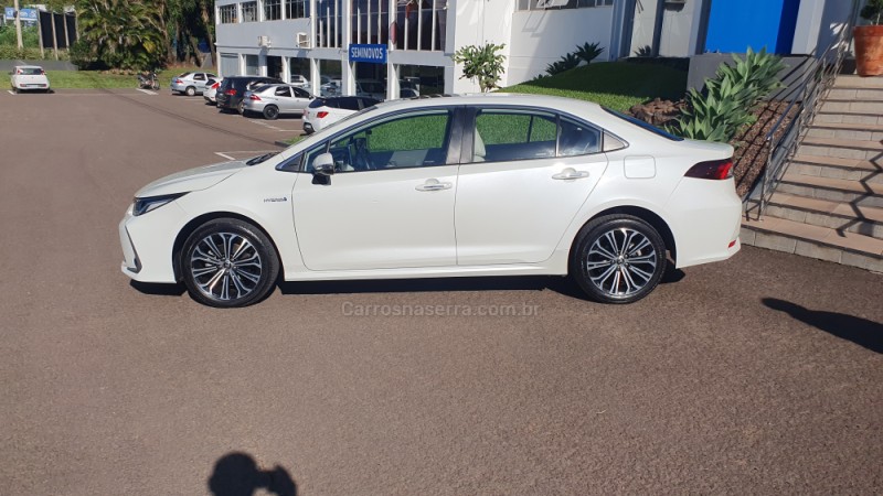 COROLLA 1.8 ALTIS PREMIUM 16V HÍBRIDO 4P AUTOMÁTICO - 2021 - ENCANTADO