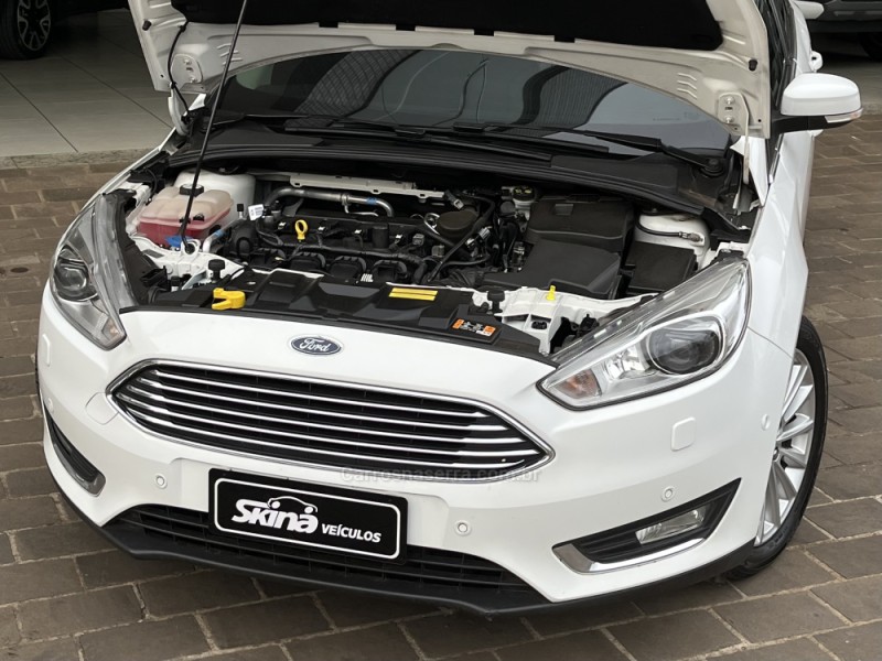FOCUS 2.0 TITANIUM PLUS 16V FLEX 4P AUTOMÁTICO - 2018 - VACARIA