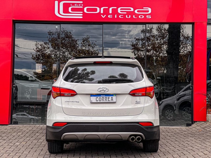 SANTA FÉ 3.3 MPFI 4X4 7 LUGARES V6 270CV GASOLINA 4P AUTOMÁTICO - 2015 - CANELA