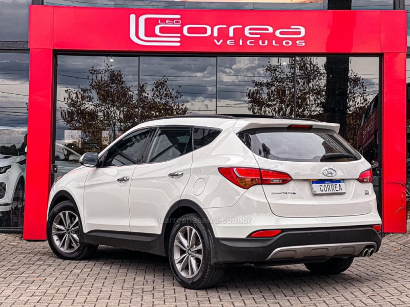 SANTA FÉ 3.3 MPFI 4X4 7 LUGARES V6 270CV GASOLINA 4P AUTOMÁTICO - 2015 - CANELA