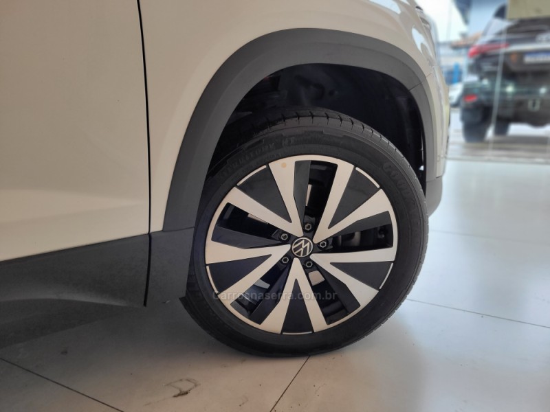 TAOS 1.4 16V HIGHLINE TSI FLEX 4P AUTOMÁTICO - 2023 - CANELA