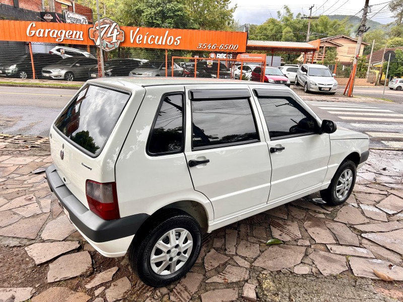 UNO 1.0 MPI MILLE FIRE ECONOMY 8V FLEX 4P MANUAL - 2012 - TRêS COROAS