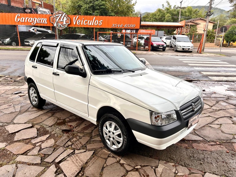 UNO 1.0 MPI MILLE FIRE ECONOMY 8V FLEX 4P MANUAL - 2012 - TRêS COROAS