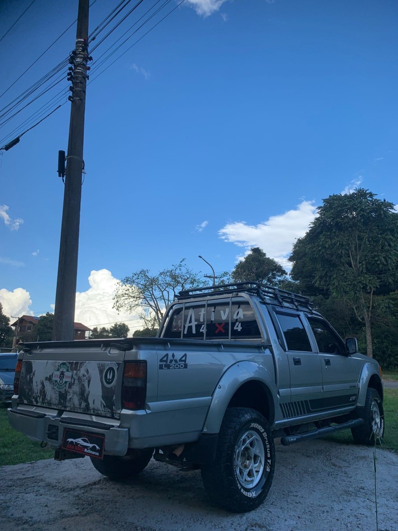 L200 2.5 GLS 4X4 CD 8V TURBO DIESEL 4P MANUAL - 2004 - CAXIAS DO SUL