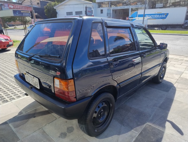 UNO 1.0 IE MILLE EP 8V GASOLINA 4P MANUAL - 1996 - CAXIAS DO SUL