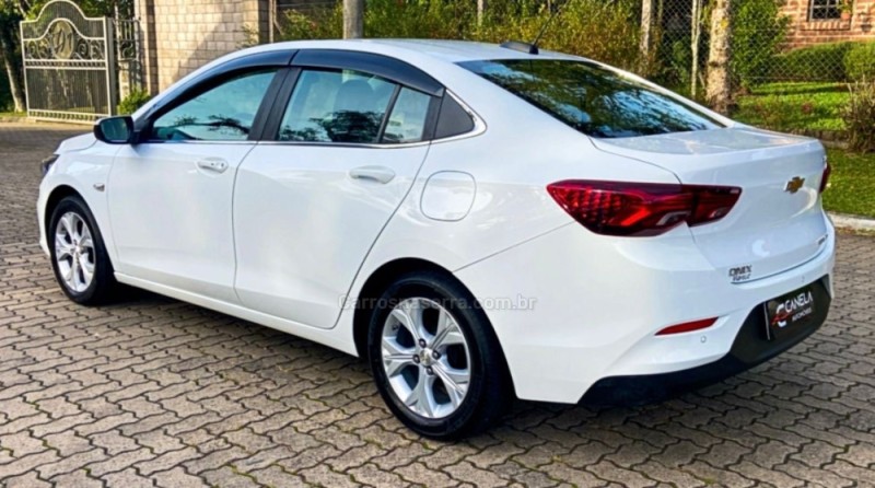 ONIX 1.0	PREMIER PLUS 12V TURBO FLEX 4P AUTOMÁTICO - 2021 - CANELA
