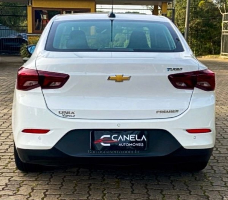 ONIX 1.0	PREMIER PLUS 12V TURBO FLEX 4P AUTOMÁTICO - 2021 - CANELA