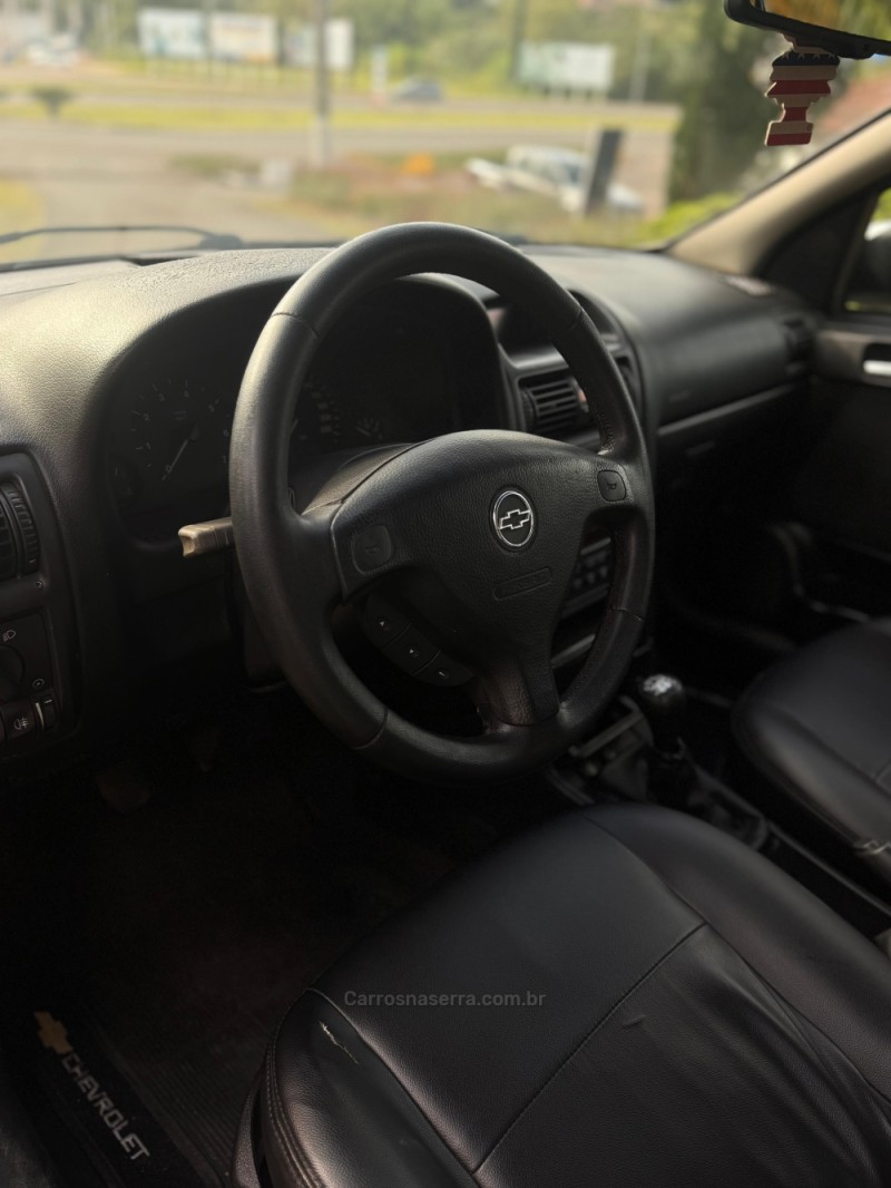 ASTRA 2.0 SFI GSI 16V GASOLINA 4P MANUAL - 2004 - FELIZ