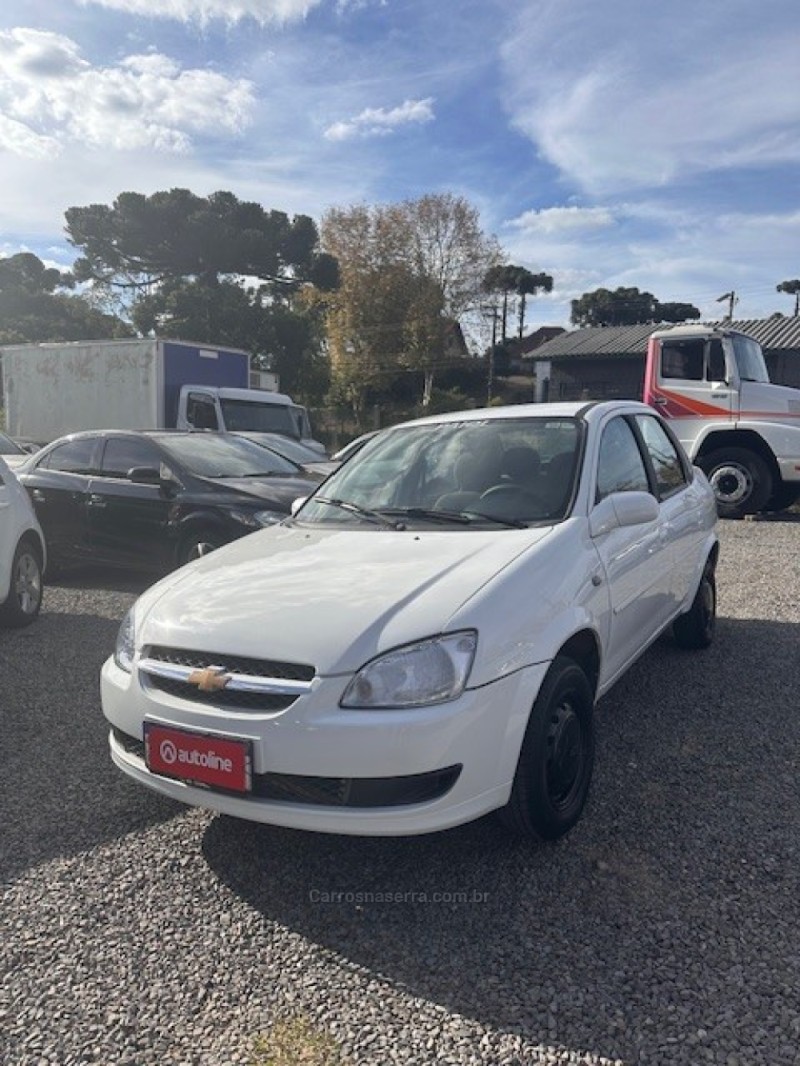 classic 1.0 vhc ls 8v flex 4p manual 2011 canela