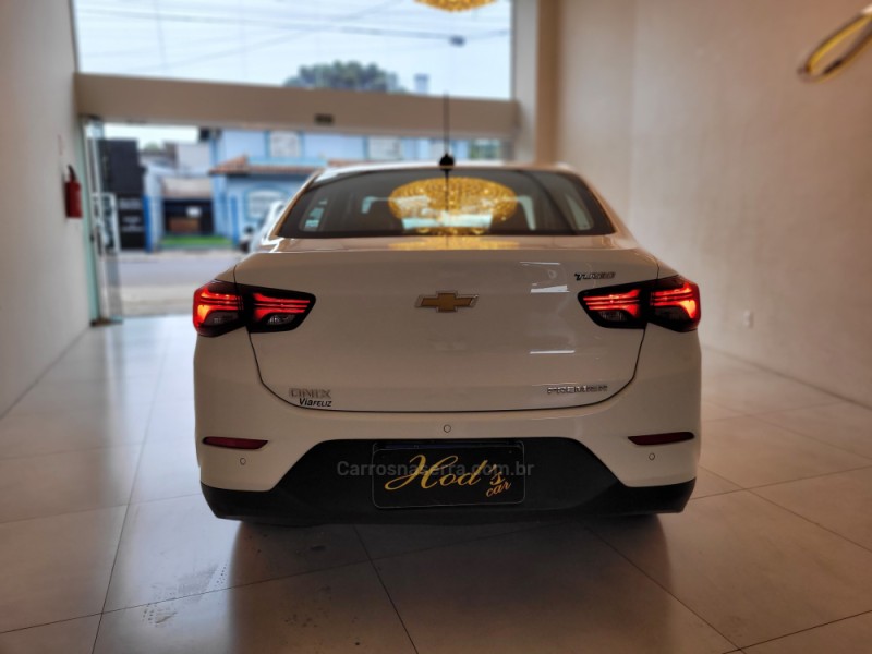 ONIX 1.0	PREMIER PLUS 12V TURBO FLEX 4P AUTOMÁTICO - 2021 - CANELA