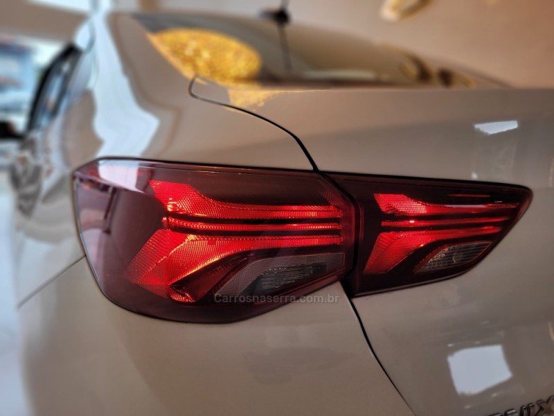 ONIX 1.0	PREMIER PLUS 12V TURBO FLEX 4P AUTOMÁTICO - 2021 - CANELA