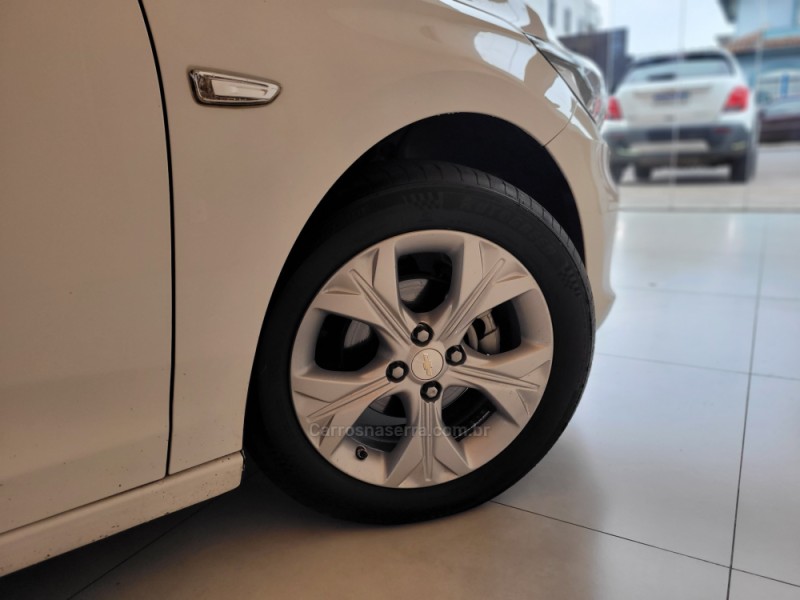 ONIX 1.0	PREMIER PLUS 12V TURBO FLEX 4P AUTOMÁTICO - 2021 - CANELA