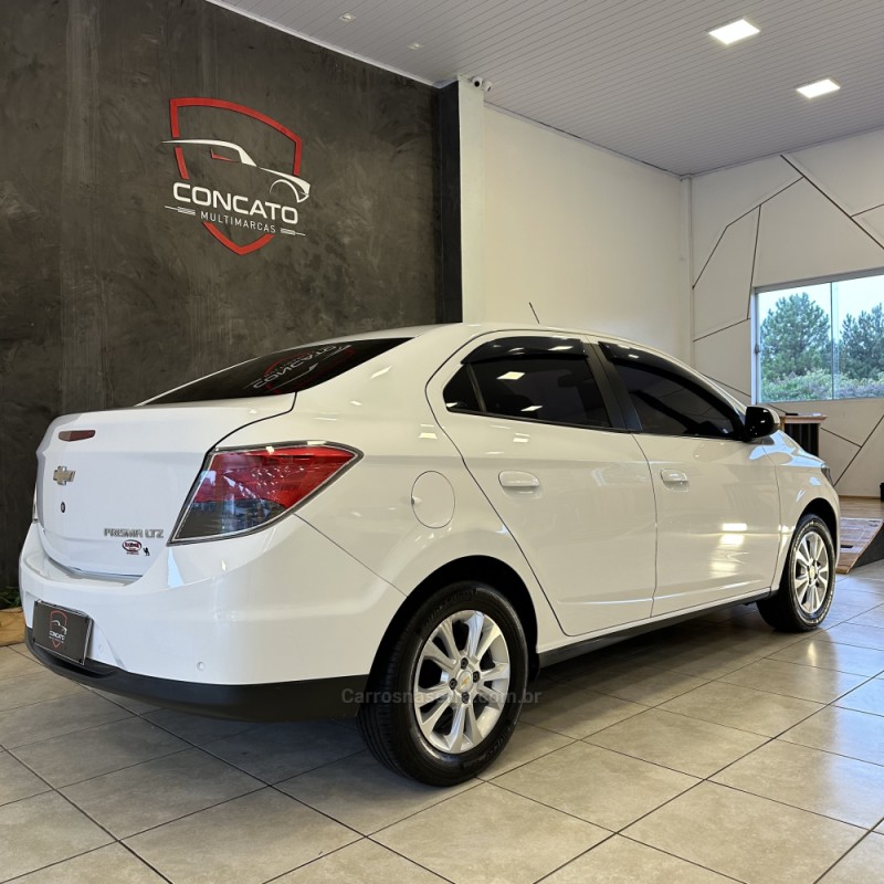PRISMA 1.4 MPFI LTZ 8V FLEX 4P MANUAL - 2015 - FARROUPILHA