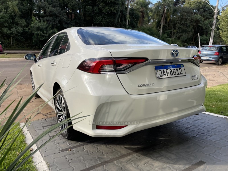 COROLLA 1.8 ALTIS PREMIUM 16V HÍBRIDO 4P AUTOMÁTICO - 2021 - GUAPORé