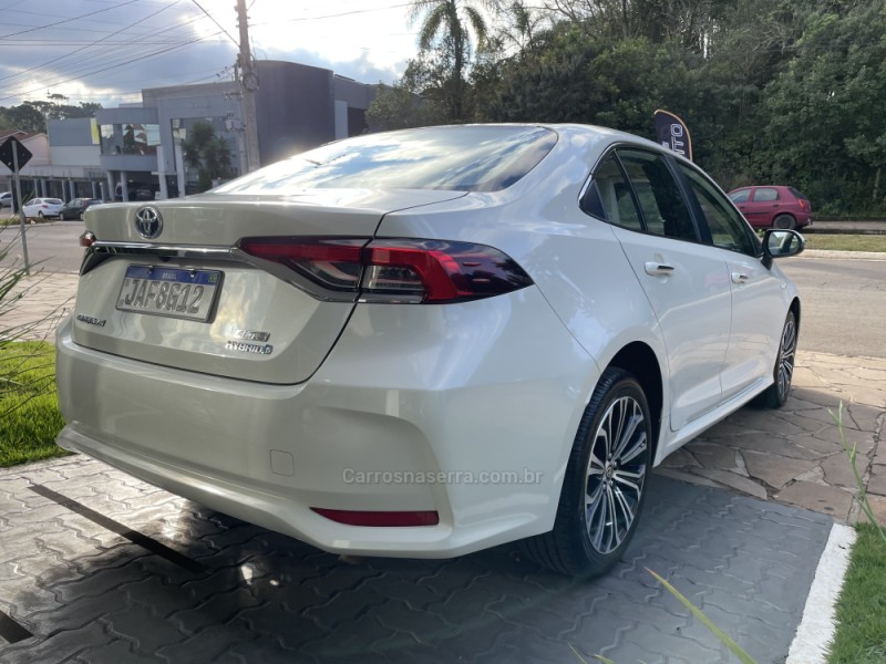 COROLLA 1.8 ALTIS PREMIUM 16V HÍBRIDO 4P AUTOMÁTICO - 2021 - GUAPORé
