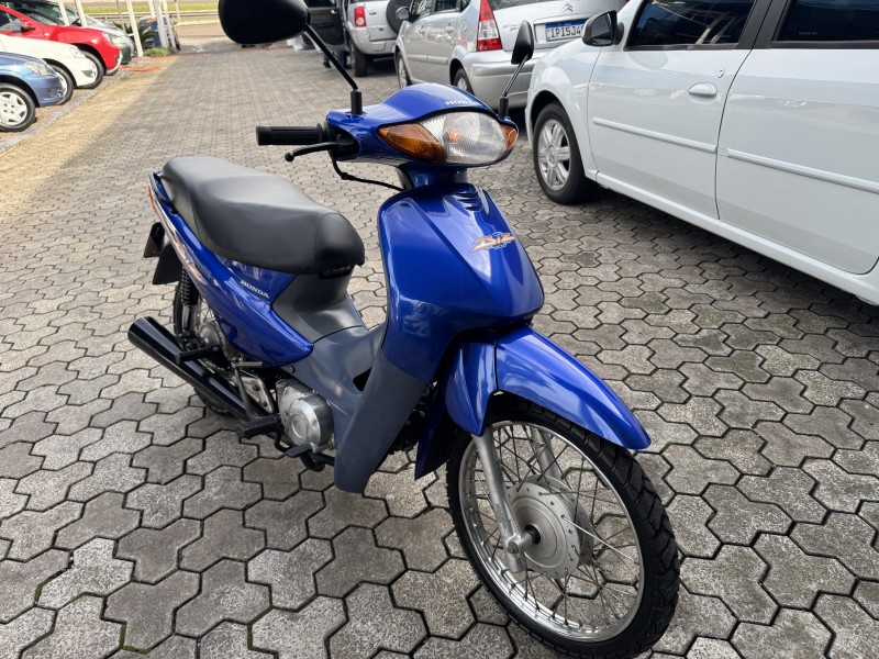 c 100 biz es 2003 dois irmaos