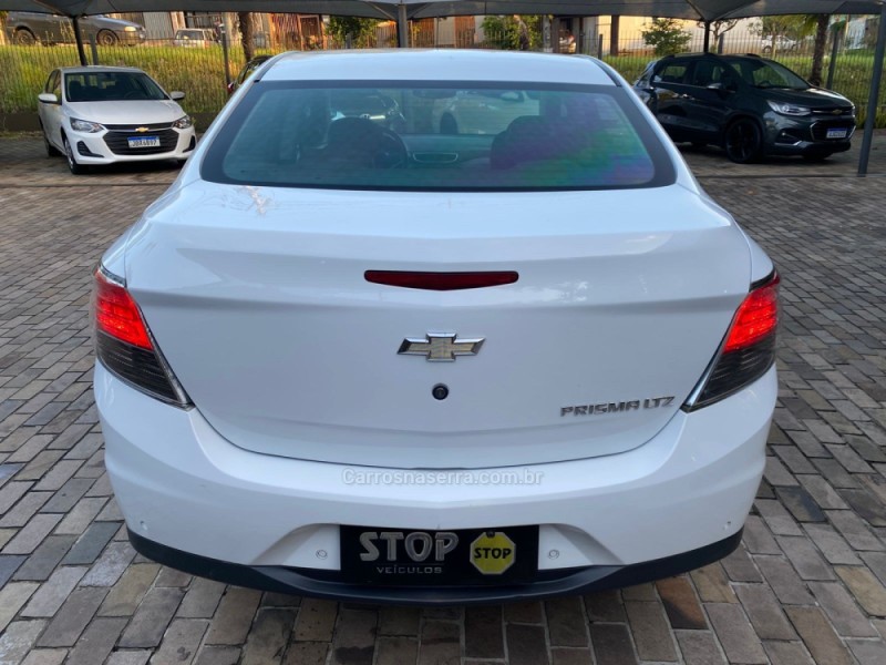 PRISMA 1.4 MPFI LTZ 8V FLEX 4P MANUAL - 2015 - DOIS IRMãOS
