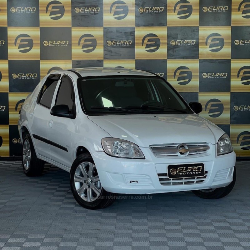 prisma 1.0 mpfi lt 8v flex 4p manual 2011 portao