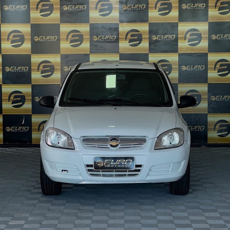PRISMA 1.0 MPFI LT 8V FLEX 4P MANUAL - 2011 - PORTãO