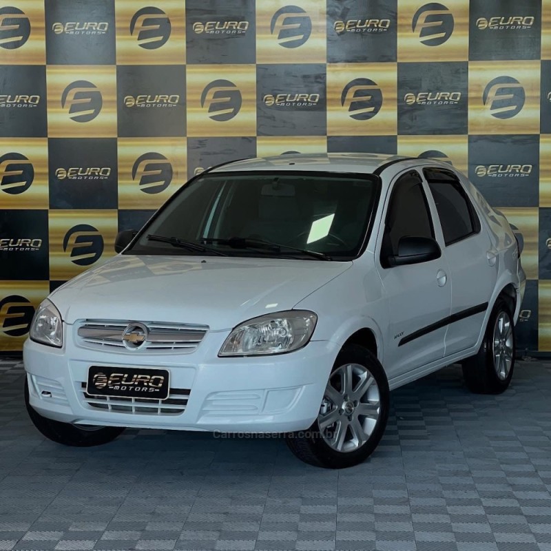 PRISMA 1.0 MPFI LT 8V FLEX 4P MANUAL - 2011 - PORTãO