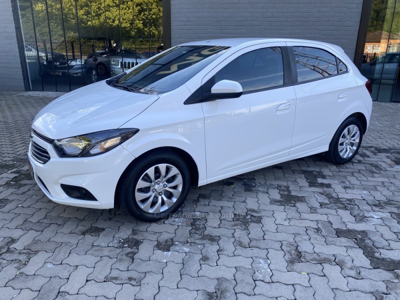 ONIX 1.0 JOY BLACK 8V FLEX 4P MANUAL - 2021 - PORTãO
