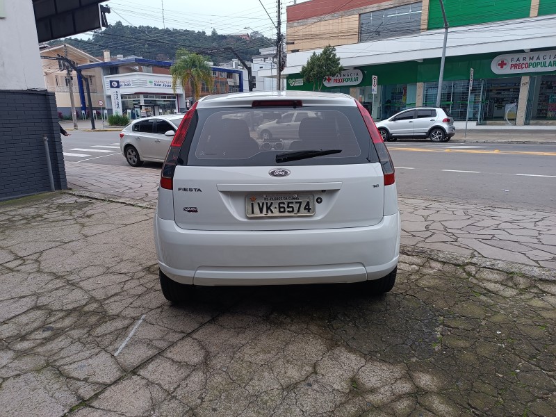 FIESTA 1.6 MPI HATCH 8V FLEX 4P MANUAL - 2014 - FLORES DA CUNHA