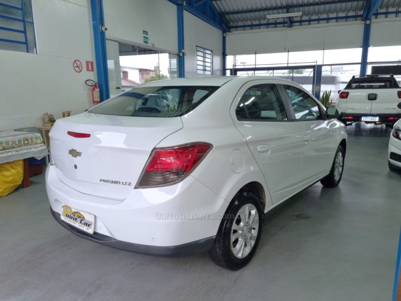 PRISMA 1.4 MPFI LTZ 8V FLEX 4P MANUAL - 2014 - VACARIA