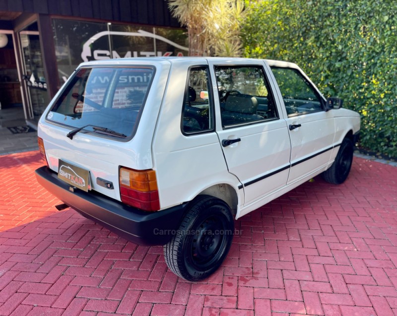 UNO 1.0 MPI MILLE 8V GASOLINA 4P MANUAL - 2002 - ROLANTE