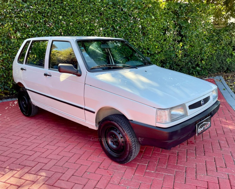 UNO 1.0 MPI MILLE 8V GASOLINA 4P MANUAL - 2002 - ROLANTE