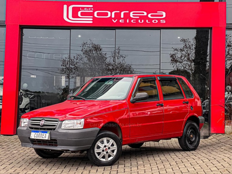 UNO 1.0 MPI MILLE WAY ECONOMY 8V FLEX 4P MANUAL - 2013 - CANELA