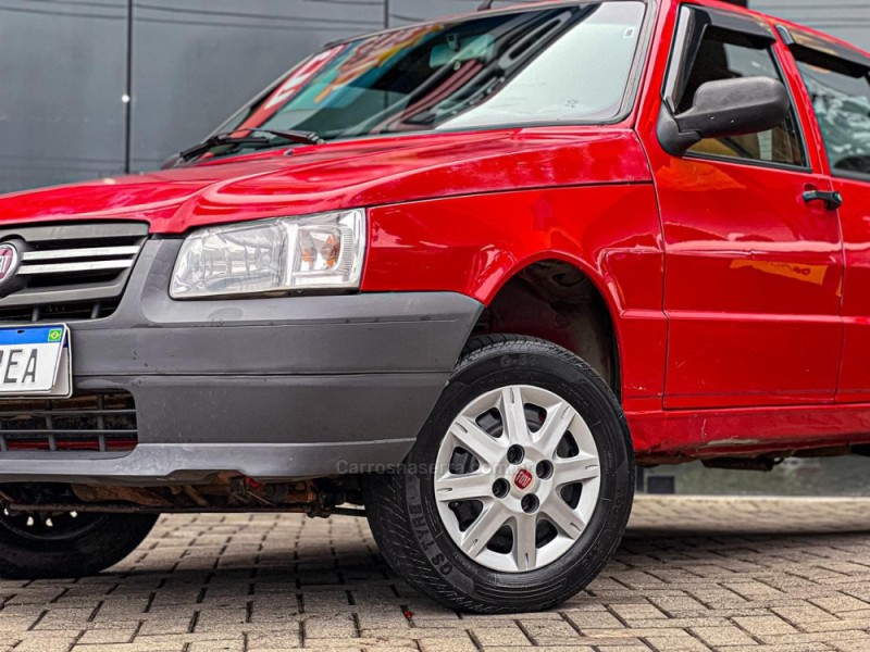UNO 1.0 MPI MILLE WAY ECONOMY 8V FLEX 4P MANUAL - 2013 - CANELA
