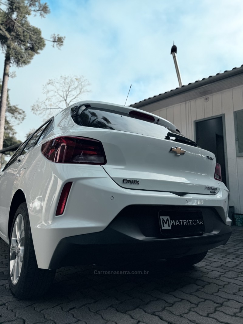 ONIX 1.0 PREMIER 12V TURBO FLEX 4P AUTOMÁTICO - 2021 - CANELA