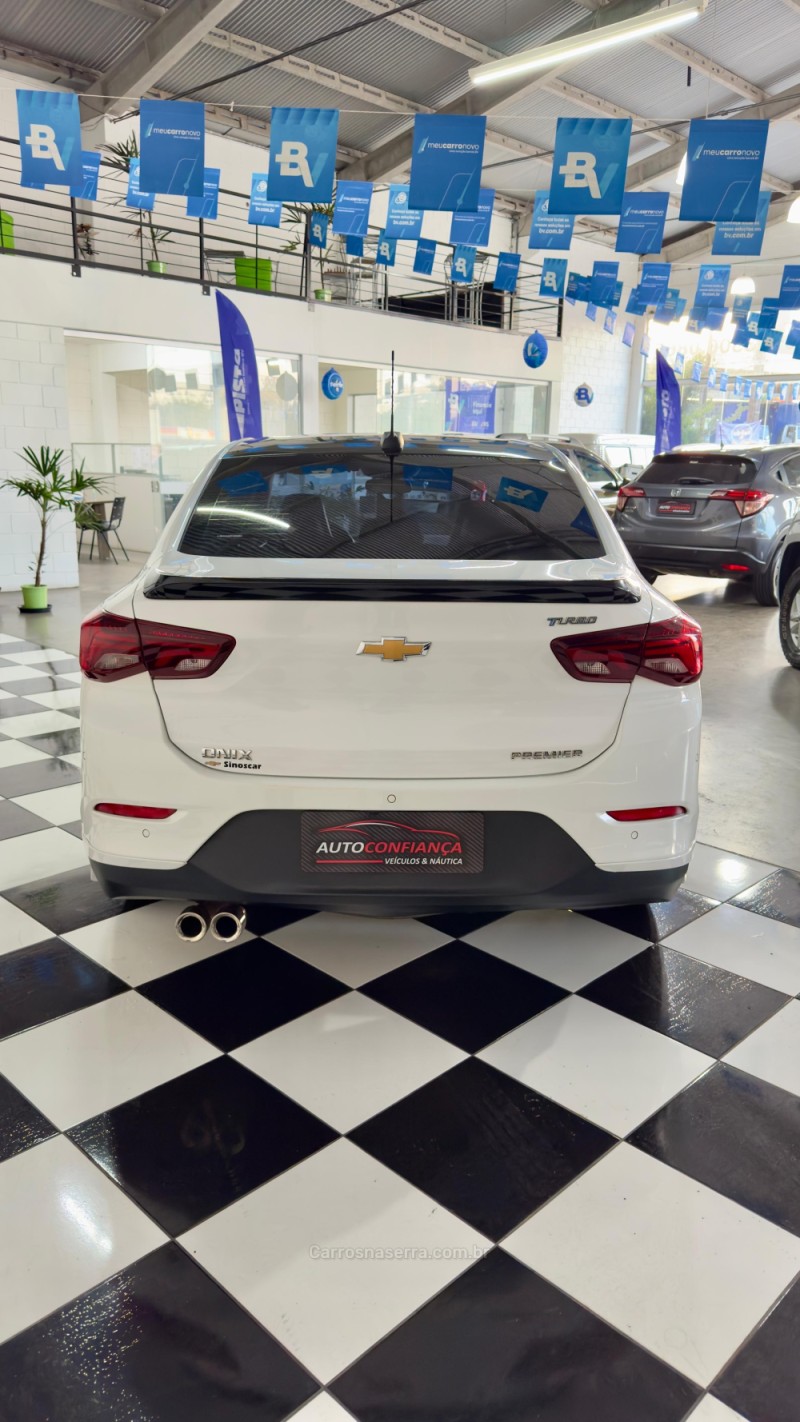 ONIX 1.0	PREMIER PLUS 8V TURBO FLEX 4P AUTOMÁTICO - 2024 - MONTENEGRO