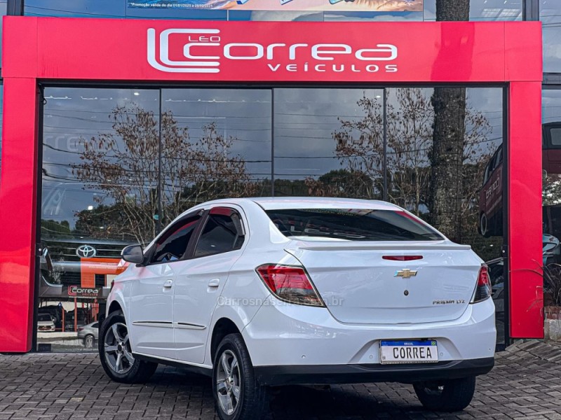 PRISMA 1.4 MPFI LTZ 8V FLEX 4P MANUAL - 2013 - CANELA