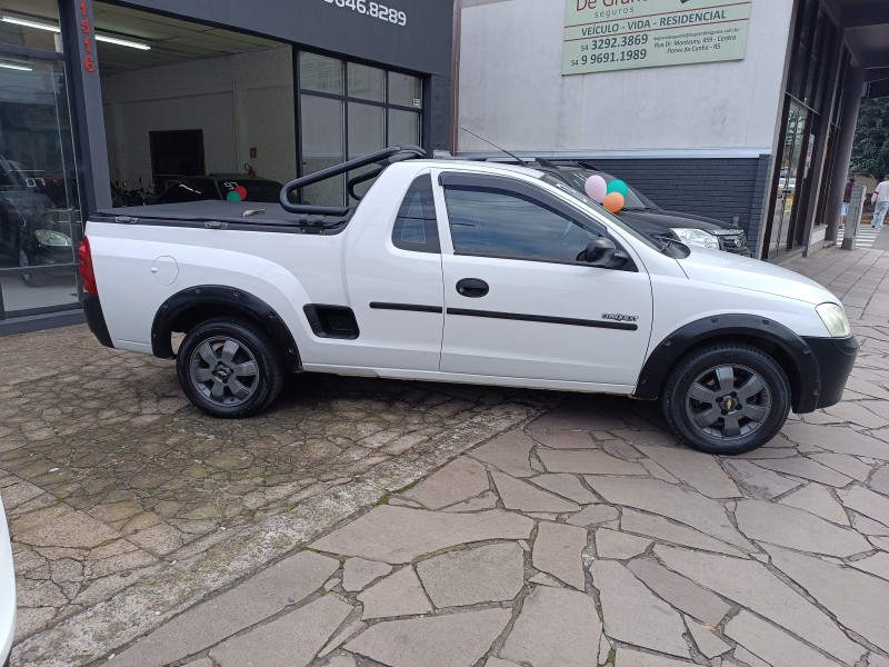 MONTANA 1.8 MPFI CONQUEST CS 8V FLEX 2P MANUAL - 2004 - FLORES DA CUNHA