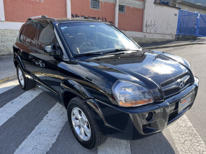 tucson 2.0 mpfi gls 16v 143cv 2wd gasolina 4p automatico 2010 caxias do sul