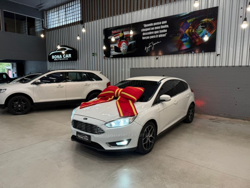 FOCUS 2.0 TITANIUM HATCH 16V FLEX 4P AUTOMÁTICO