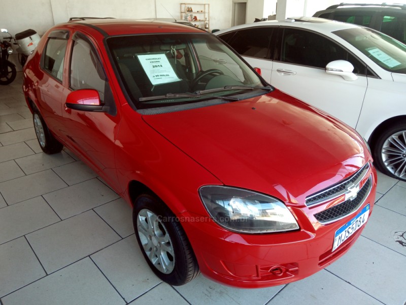 prisma 1.4 mpfi joy 8v flex 4p manual 2012 caxias do sul