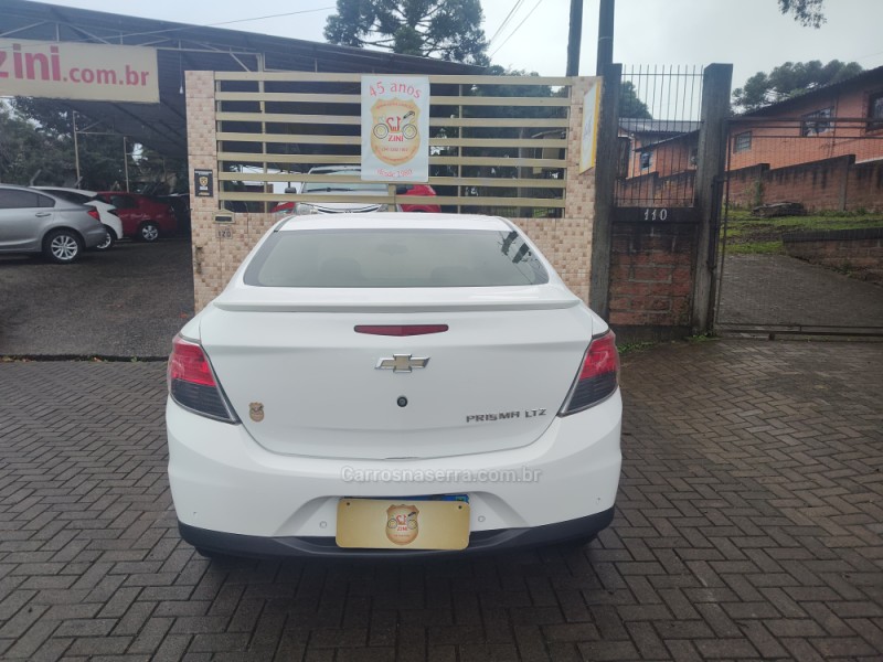 PRISMA 1.4 MPFI LTZ 8V FLEX 4P MANUAL - 2013 - CANELA