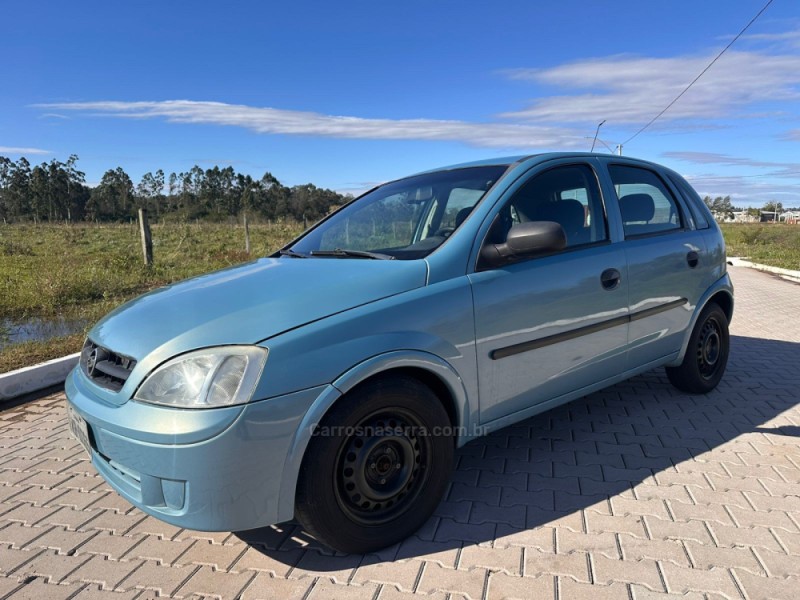 CORSA 1.0 MPFI 8V GASOLINA 4P MANUAL - 2002 - PORTãO
