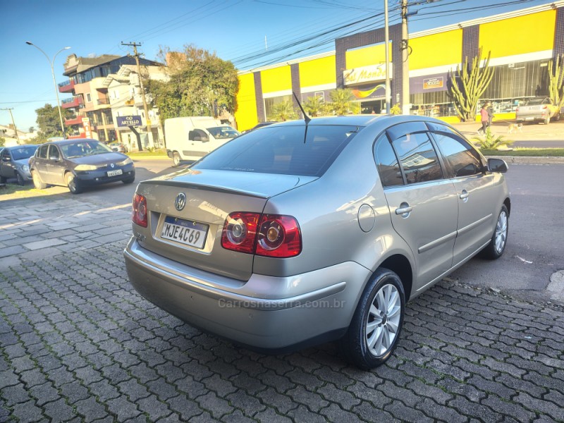 POLO SEDAN 1.6 MI COMFORTLINE 8V FLEX 4P MANUAL - 2011 - GUAPORé