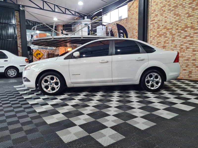 FOCUS 2.0 TITANIUM PLUS SEDAN 16V FLEX 4P AUTOMÁTICO - 2012 - FARROUPILHA