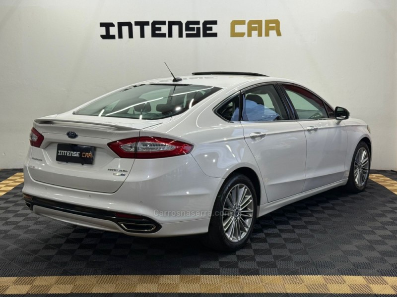 FUSION 2.0 TITANIUM AWD 16V GASOLINA 4P AUTOMÁTICO - 2016 - NOVO HAMBURGO